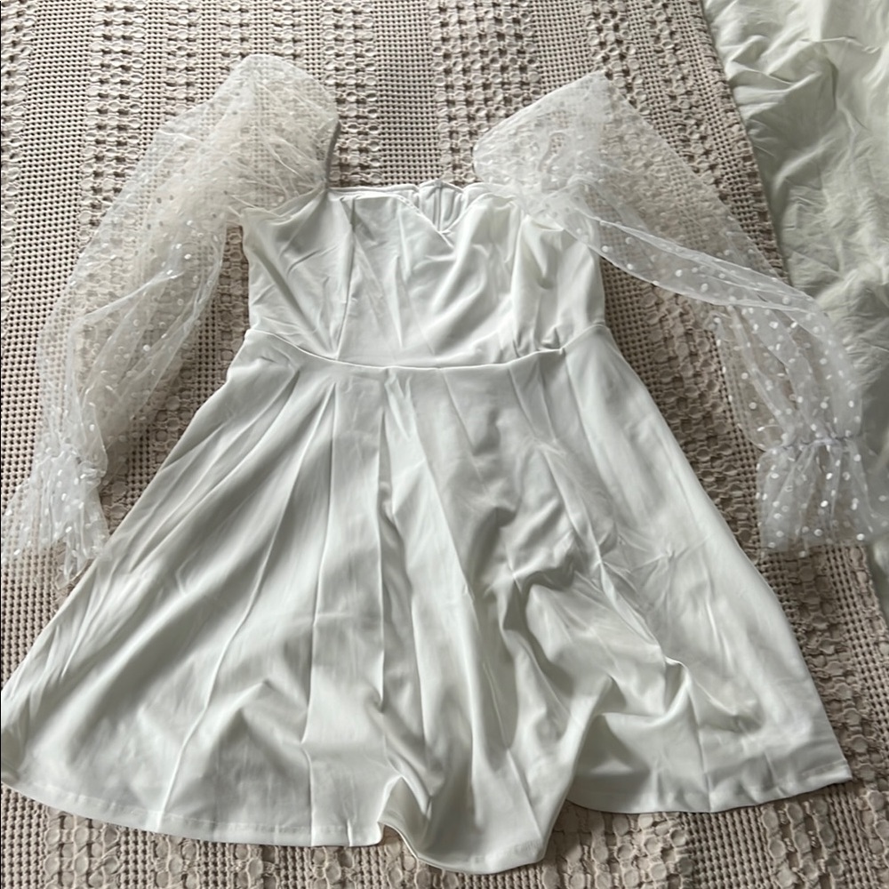 Elegant White Dress with Sheer Sleeves
